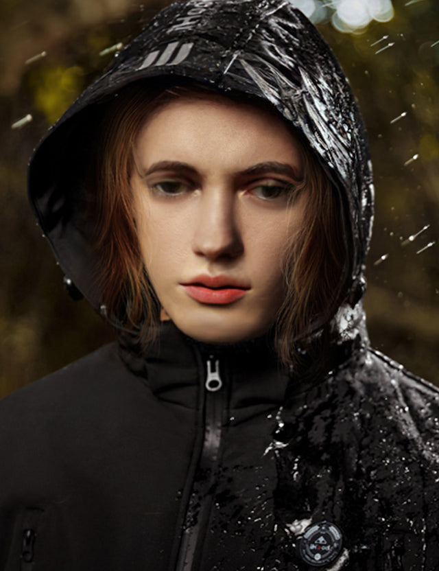 Close-up of the waterproof details on the black heated jacket, ensuring protection against the elements.