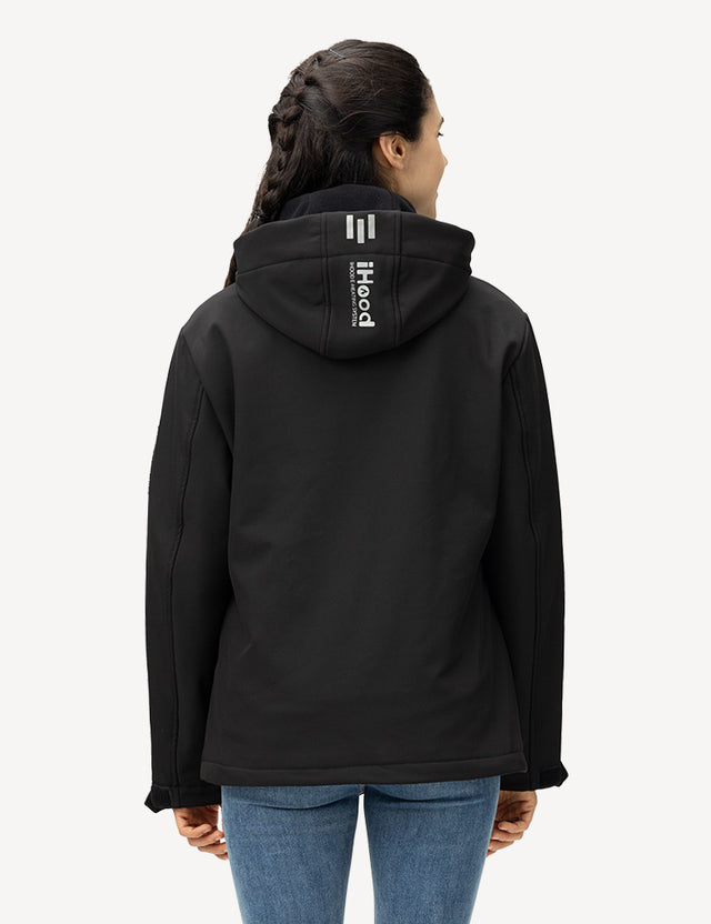 Half body back view of a model wearing a black heated jacket, showing off its fashionable fit.