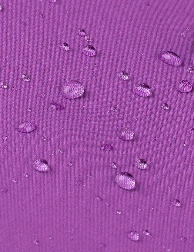 Close-up of the waterproof elements on the purple women's heated jacket, offering protection from rain and snow.